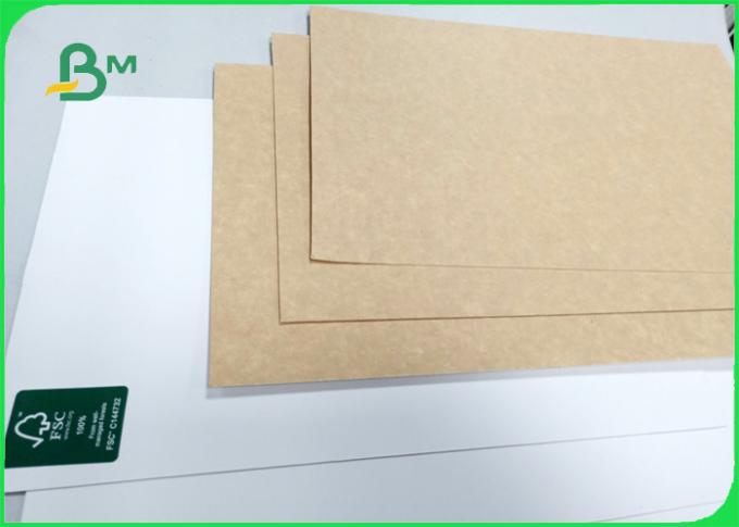 Largeur papier supérieur blanc de revêtement de la rigidité 250gsm de 748mm * de 528mm pour l'emballage