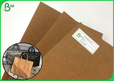 Nouveau style réutilisable et papier d'emballage lavable pliable pour faire le sac de messager