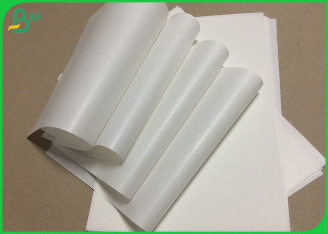 Le côté de la catégorie comestible 1 a enduit le papier blanc 30gsm 40gsm 50gsm de MG emballage pour l'emballage de sucrerie