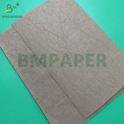 0.55mm 0.60mm Marron foncé Rouleaux de papier kraft lavés pour jeans Étiquette 150cm X 100m